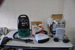 A HOOVER ALPINA PULL ALONG VACUUM CLEANER, a Philips Fan Heater, a mini fridge (all PAT pass and