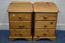 A PAIR OF PINE THREE DRAWER BEDSIDE CABINETS