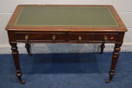 A VICTORIAN MAHOGANY WRITING DESK, with green leather and gilt tooled inlay top, two drawers, and