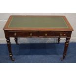 A VICTORIAN MAHOGANY WRITING DESK, with green leather and gilt tooled inlay top, two drawers, and