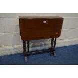 AN EDWARDIAN INLAID MAHOGANY AND CROSSBANDED SUTHERLAND TABLE with turned legs