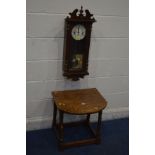 AN OAK DROP LEAF OCCASIONAL TABLE and an oak wall clock (2)