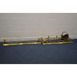 A FIVE PIECE BRASS COMPANION SET, comprising of a pair of fire dogs, fire poker, shovel, tongs,