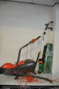 A FLYMO SPEEDI MO ELECTRIC LAWN MOWER, a Black and Decker GL335 Electric Strimmer (both PAT pass and