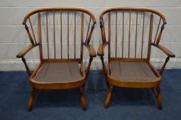 A PAIR OF MID TO LATE 20TH CENTURY BEECH SPINDLE BACK ARMCHAIRS (no cushions)