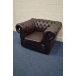 AN OXBLOOD BUTTONED CHESTERFIELD CLUB CHAIR, width 103cm