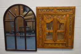A HARDWOOD AND ORNATE CARVED WALL MIRROR with two spindle doors, 80cm x 90cm along with a modern