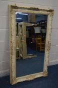 A CREAM FRENCH ORNATE RECTANGULAR BEVELLED EDGE WALL MIRROR, 150cm x 89cm and an oak oval wall