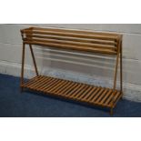 A LONG RECTANGULAR BEECH SLATTED PLANTER, on an A frame united by an undershelf, width 94cm