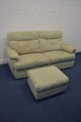 A G PLAN GREEN UPHOLSTERED TWO SEATER SETTEE, length 200cm and a pouffe with a hinged top (2)