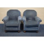 A PAIR OF EARLY 20TH CENTURY BLUE UPHOLSTERED, on carved oak front feet, width 79cm x depth 79cm x