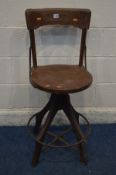 AN EARLY 20TH CENTURY BEECH DRAUGHTMANS SWIVEL CHAIR, with a single bar back