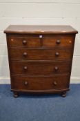 A VICTORIAN MAGOGANY BOWFRONT CHEST OF TWO SHORT OVER THREE LONG GRADUATED DRAWERS, with turned