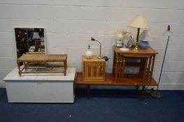 AN AVALON TEAK COFFEE TABLE, along with a teak nest of three tables, pine single door cabinet,