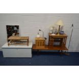 AN AVALON TEAK COFFEE TABLE, along with a teak nest of three tables, pine single door cabinet,
