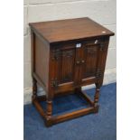 A SMALL OLD CHARM OAK LINENFOLD TWO DOOR CABINET, width 50cm x depth 36cm x height 71cm