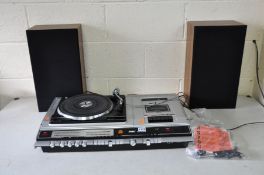 A VINTAGE GEC SOUNDECK MUSIC CENTRE with two speakers (PAT fail due to uninsulated plug but
