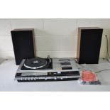 A VINTAGE GEC SOUNDECK MUSIC CENTRE with two speakers (PAT fail due to uninsulated plug but