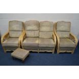 A WICKER FIVE PIECE CONSERVATORY SUITE, with a stripped cushions, comprising a two seater settee,