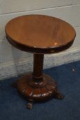 A VICTORIAN WALNUT CIRCULAR TOPPED OCCASIONAL TABLE, on a cylindrical tapering support, slopped