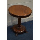 A VICTORIAN WALNUT CIRCULAR TOPPED OCCASIONAL TABLE, on a cylindrical tapering support, slopped