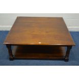 A REPRODUCTION SQUARE OAK COFFEE TABLE, on block and turned legs united by an undershelf, 122cm
