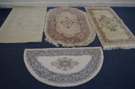 THREE VARIOUS CHINESE RUGS of various shapes and colours along with another rug (4)