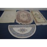 THREE VARIOUS CHINESE RUGS of various shapes and colours along with another rug (4)