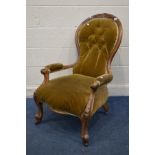 A VICTORIAN WALNUT SPOON BACK ARMCHAIR on scrolled front legs (Sd and loose joints)