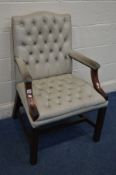 A REPRODUCTION GEORGIAN STYLE MAHOGANY GAINSBOROUGH LIBRARY CHAIR, with buttoned olive green