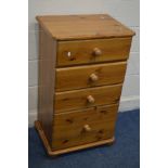 A TALL MODERN PINE CHEST OF FOUR ASSORTED DRAWERS, width 56cm x depth 41cm x height 96cm (Sd)