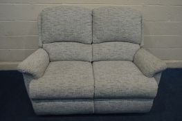 AN UPHOLSTERED TWO SEATER SETTEE, width 140cm
