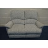 AN UPHOLSTERED TWO SEATER SETTEE, width 140cm