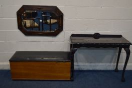 AN EARLY TO MID 20TH CENTURY OAK BEVELLED EDGE WALL MIRROR, with canted corners, 85cm x 57cm along