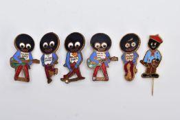 SIX ROBERTSON JAM GOLLY BADGES, to include two guitar players, golfing, dancing and painting styles,