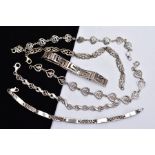 A BAG OF ASSORTED SILVER AND WHITE METAL BRACELETS, to include a silver Greek key style bracelet,