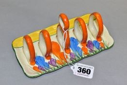 A CLARICE CLIFF BIZARRE CROCUS PATTERN FIVE BAR TOAST RACK, painted decoration, printed marks,