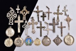 A BAG OF ASSORTED SILVER AND WHITE METAL PENDANTS, to include crosses, crucifixes and St Christopher