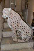 A LARGE HANSA SOFT TOY SITTING LEOPARD, pink plush with black spots with white stripe to