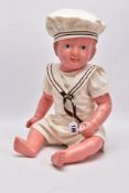 A LUCKY TOYS PLASTIC DOLL, c.1960's, moulded hair and features with painted eyes and lips, jointed