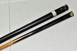 A PADMORE & SONS SNOOKER CUE, with metal cue case (Condition:- end of the cue well used and worn
