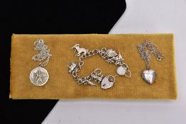 A SELECTION OF GEORG JENSEN JEWELLERY, to include a St. Christopher pendant stamped 'Silver' 'G.J