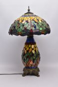 A TIFFANY STYLE TABLE LAMP, Dragonfly design to lamp shade, the baluster shaped body is mounted to a