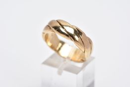 A 9CT GOLD WIDE BAND, of a twisted design, approximate width 6.8mm, hallmarked 9ct gold