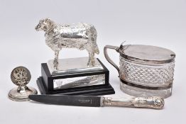 A BOX OF ASSORTED SILVER ITEMS, to include a silver filled trophy in the form of a ram, on a