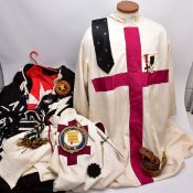 A CASE OF MASONIC KNIGHTS TEMPLAR REGALIA AND OTHERS, to include a red and cream knights templar