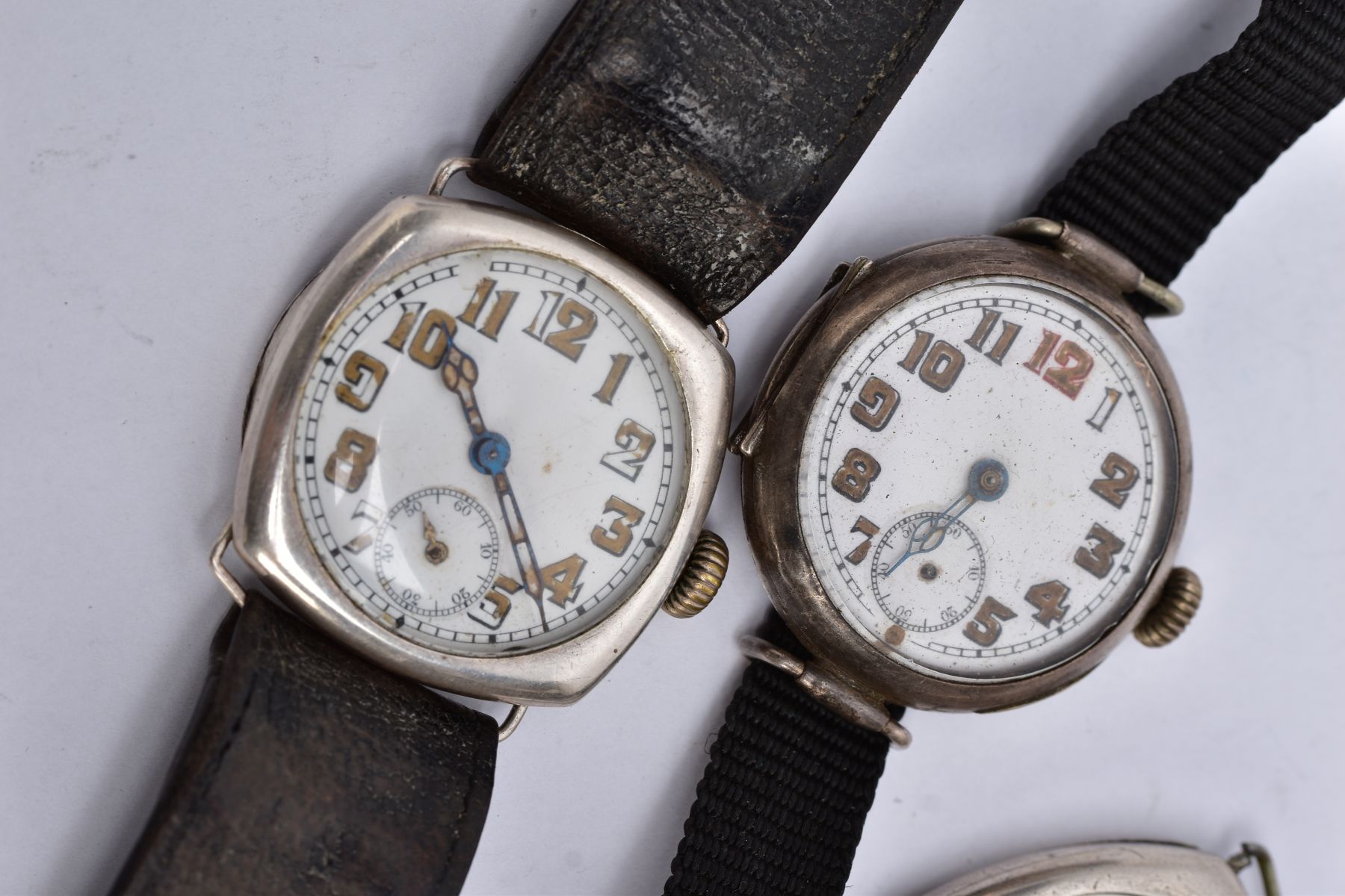 FOUR SILVER MILITARY TRENCH WRISTWATCHES, to include one with a round white dial, Arabic numerals, - Image 2 of 4