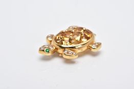 AN 18CT GOLD GEM SET BROOCH, in the form of a turtle, citrine cabochon set shell, with round
