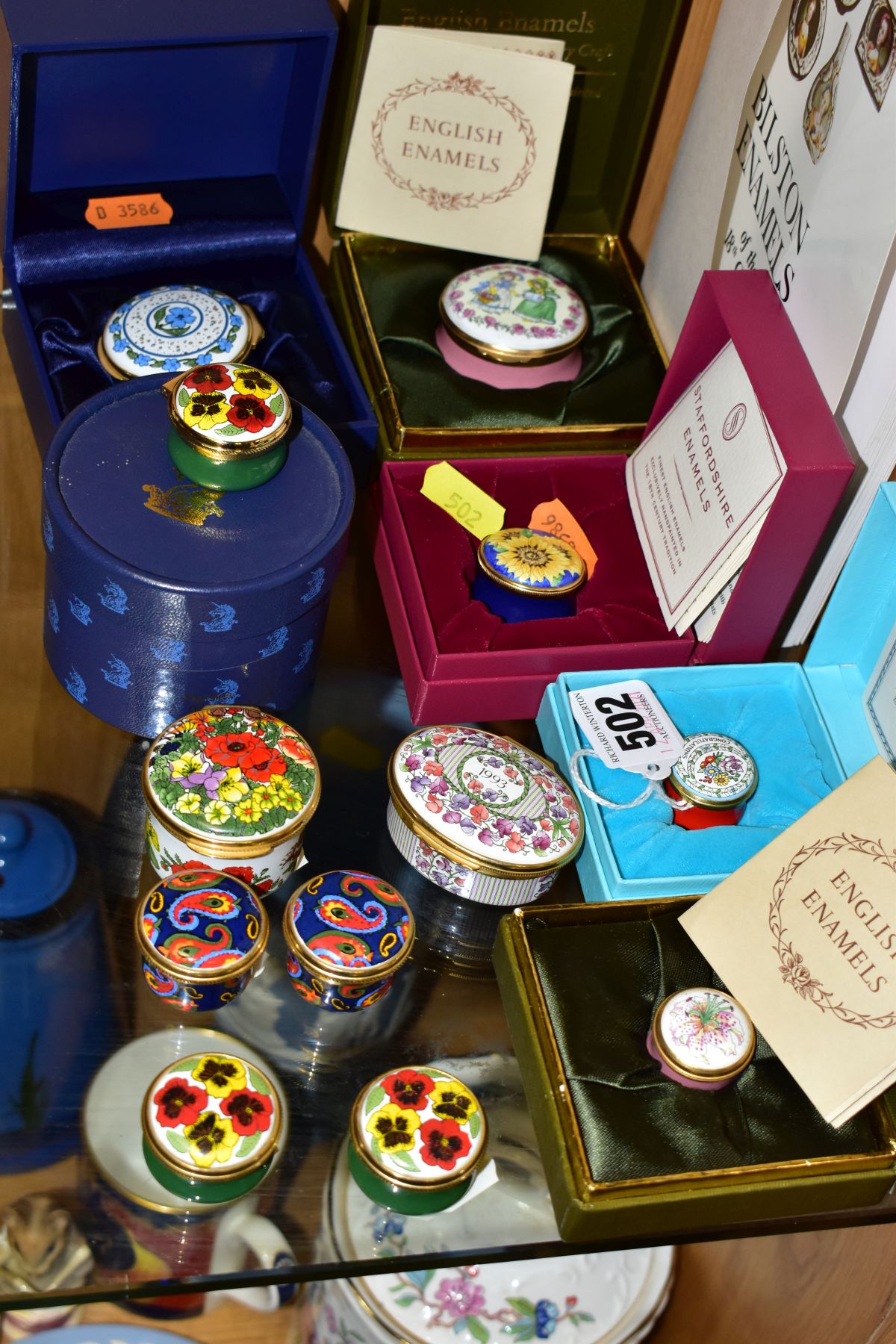 A GROUP OF ENAMEL BOXES, some boxed , comprising Halcyon Days, 'Congratulations' (boxed) and '1993 a