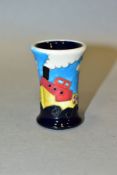 A MOORCROFT POTTERY MINIATURE VASE, decorated with small boat at sea, impressed backstamp and